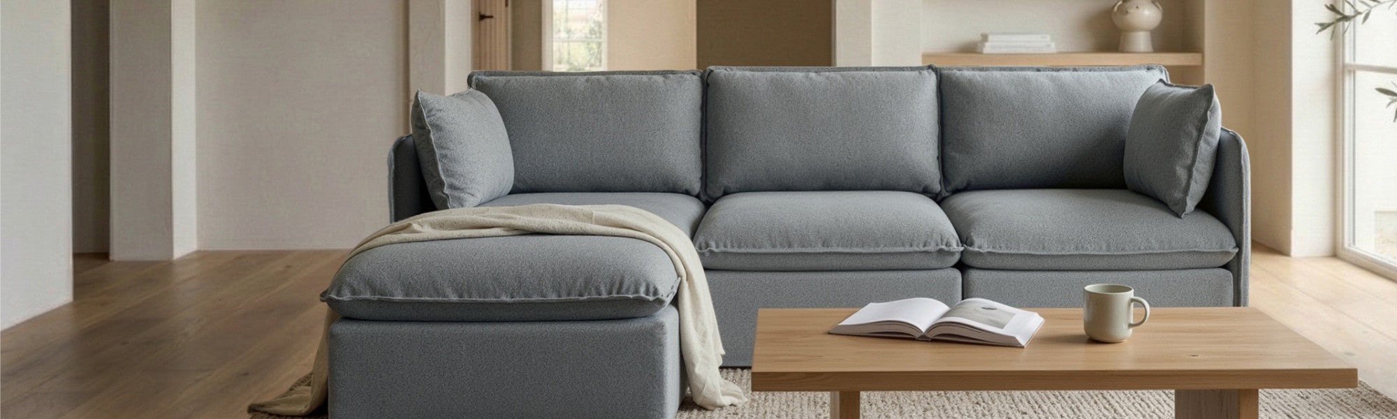 Lifestyle banner image of a modular 3-seater sectional sofa in Ash fabric styled in a real home setting, highlighting a 30-day risk-free trial.