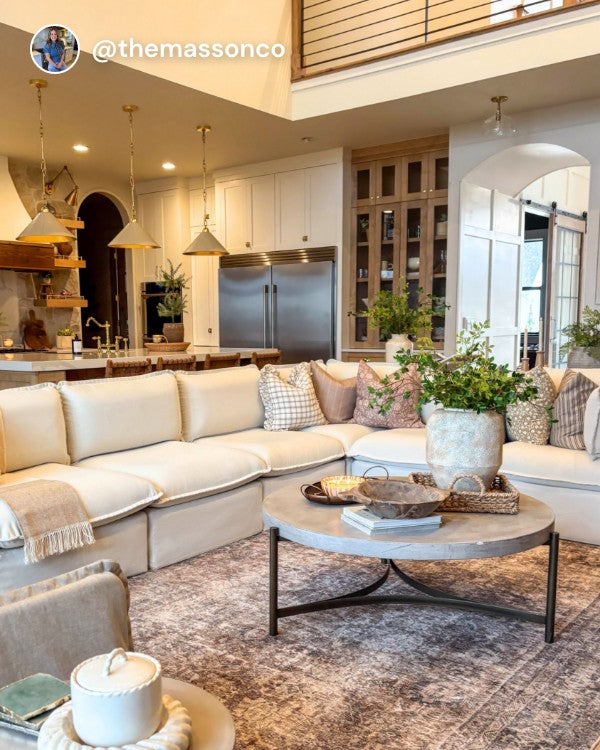 Lifestyle image of a Modular Washable 7-Seater Corner Sectional in Eggshell fabric, shown in a real customer home setting.