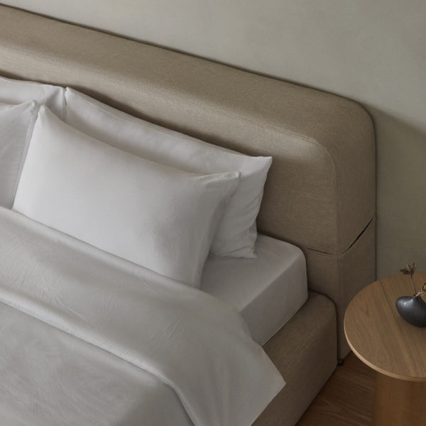 washable slipcover bed frame in oat tan fabric featuring CertiPUR-US and OEKO-TEX certified foam and non-toxic upholstery materials.
